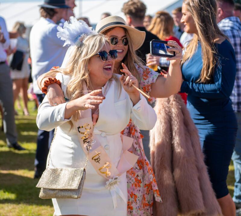 A bride to be and her friend enjoying her hen do at Bath Races
