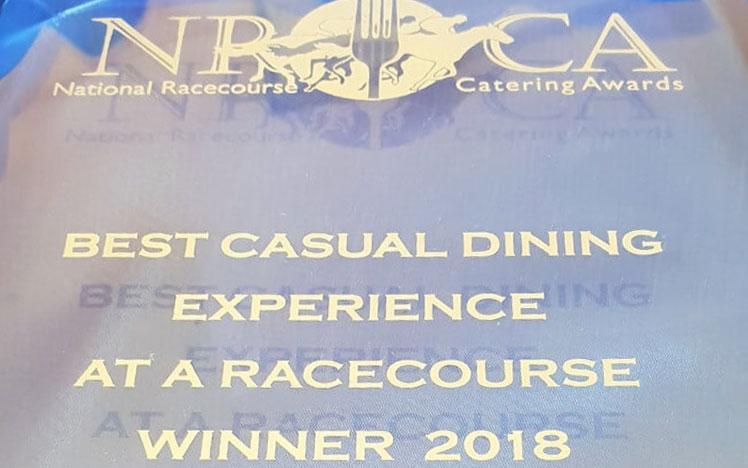 Close up on an award for Bath Racecourse for best casual dining experience.